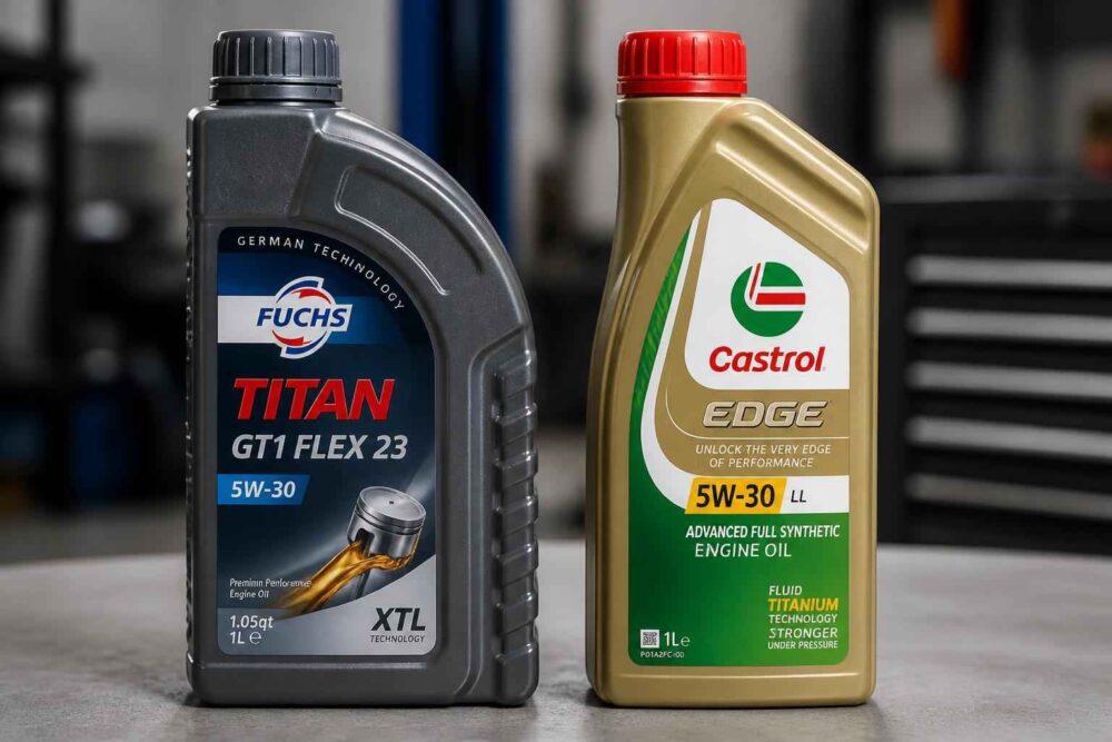 Dwie butelki oleju silnikowego Fuchs Titan i Castrol Edge 5W-30 na blacie roboczym